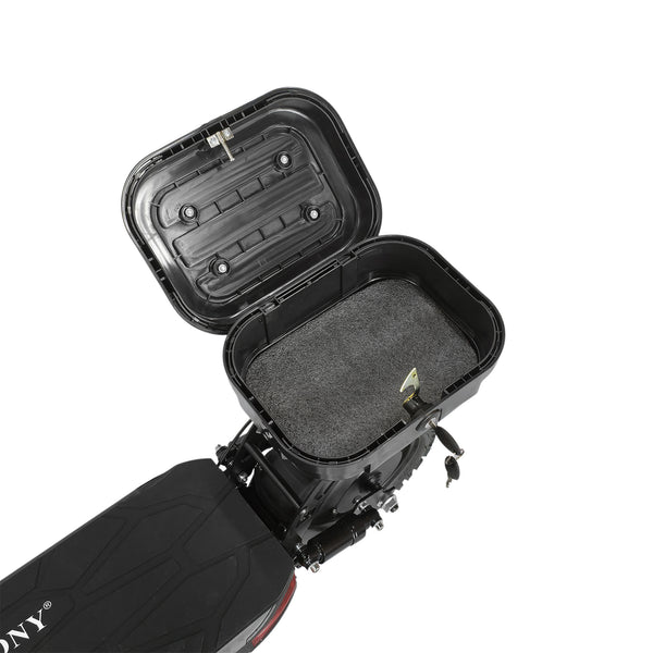 The CRONY V18 features dual 1500W motors for powerful performance, reaching 40 KM/H speed. Equipped with a 48V 18AH battery for 30–60 KM range, plus a mobile phone holder and Bluetooth speaker for added convenience and a smoother riding experience.